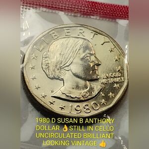 👌1980  D Susan B. Anthony Dollar Coin.Still IN CELLO CLAD UNCIRCULATED 🔥